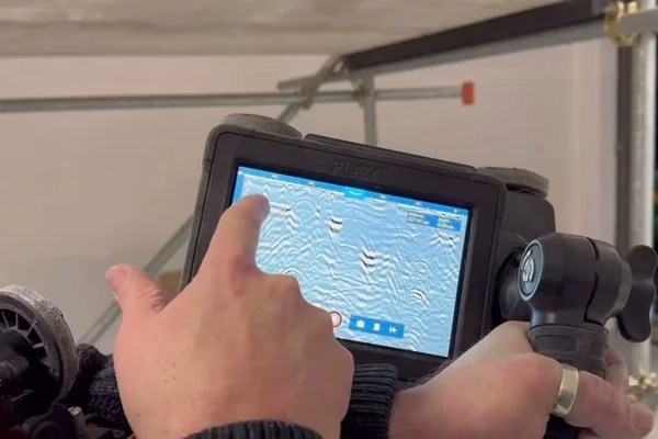 RAAC CFRP strengthening - NDTSCan GSSI Flex NX being used to identify rebar layout on CFRP Installation with Structured Carbon